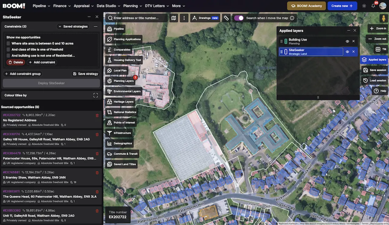 The Building Use layer colouring buildings by use type on the map in BOOM!